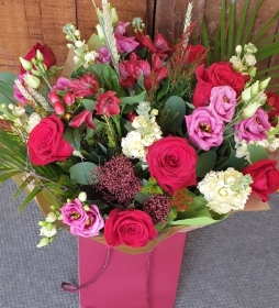 Mixed reds with roses