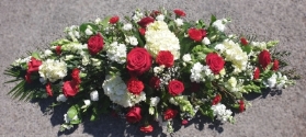 Red and White casket spray